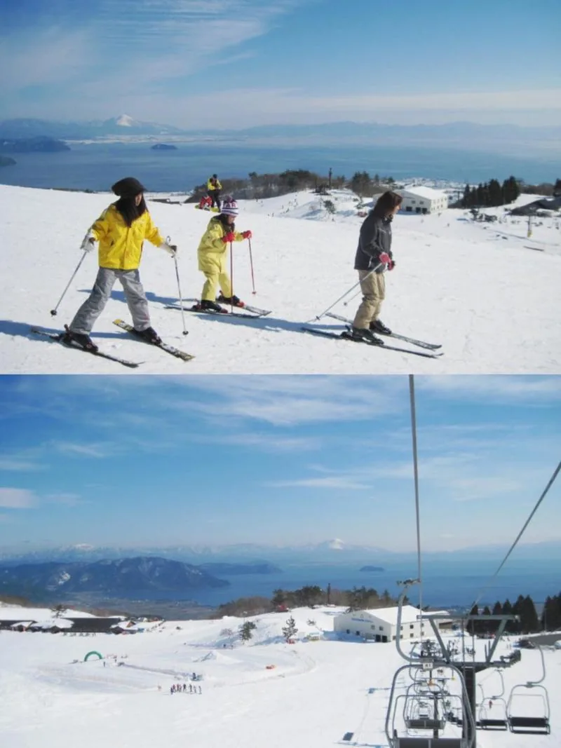 Skiers with lake view